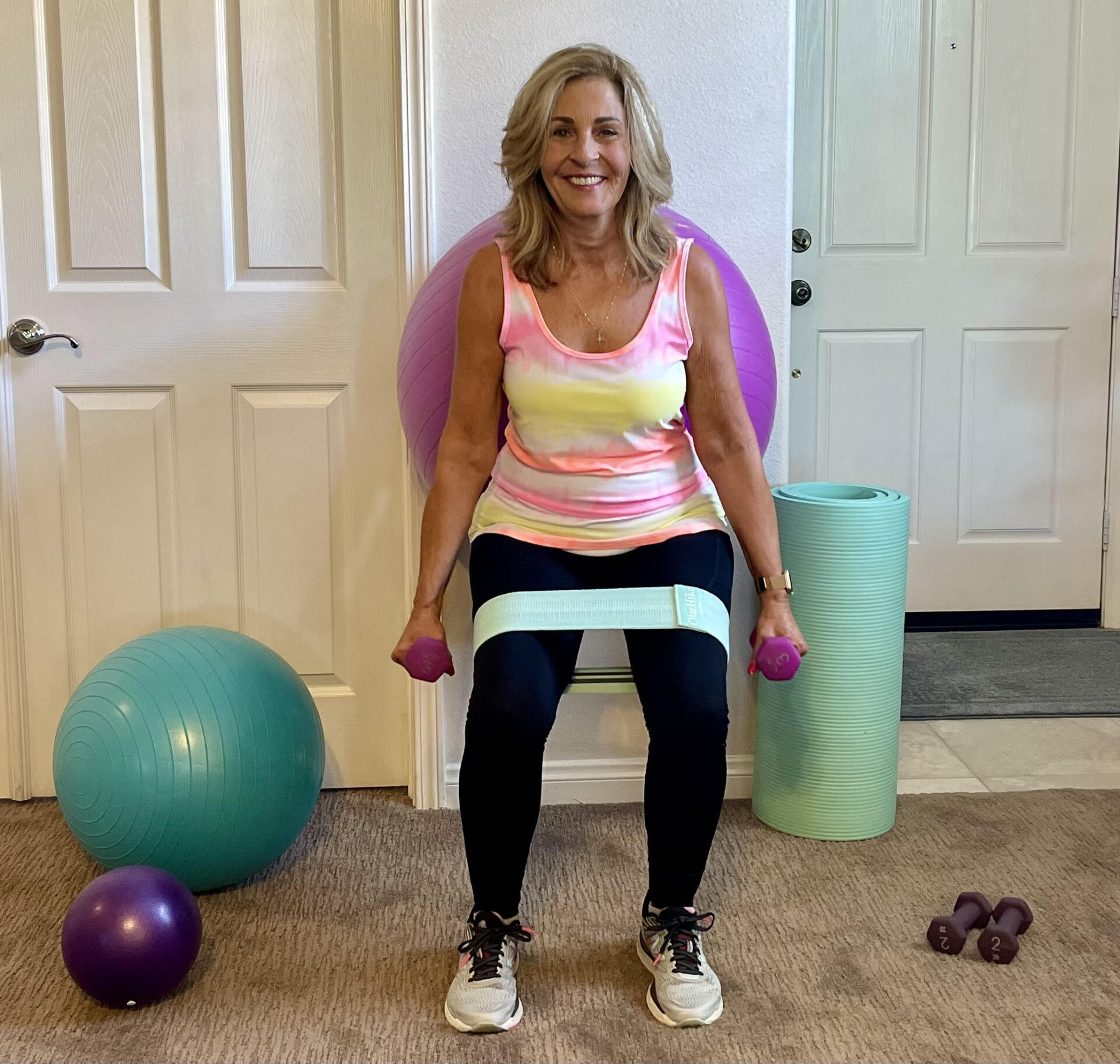 Woman Squating on Physioball