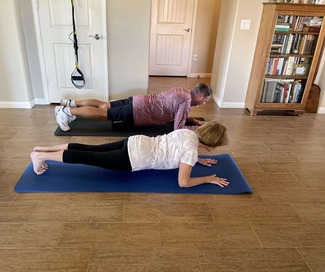 Woman and Man Planking